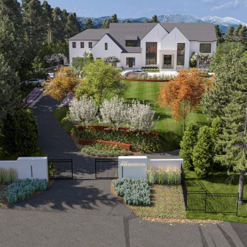 Private driveway approach to luxury home in McLean VA surrounded by lush greenery and trees.